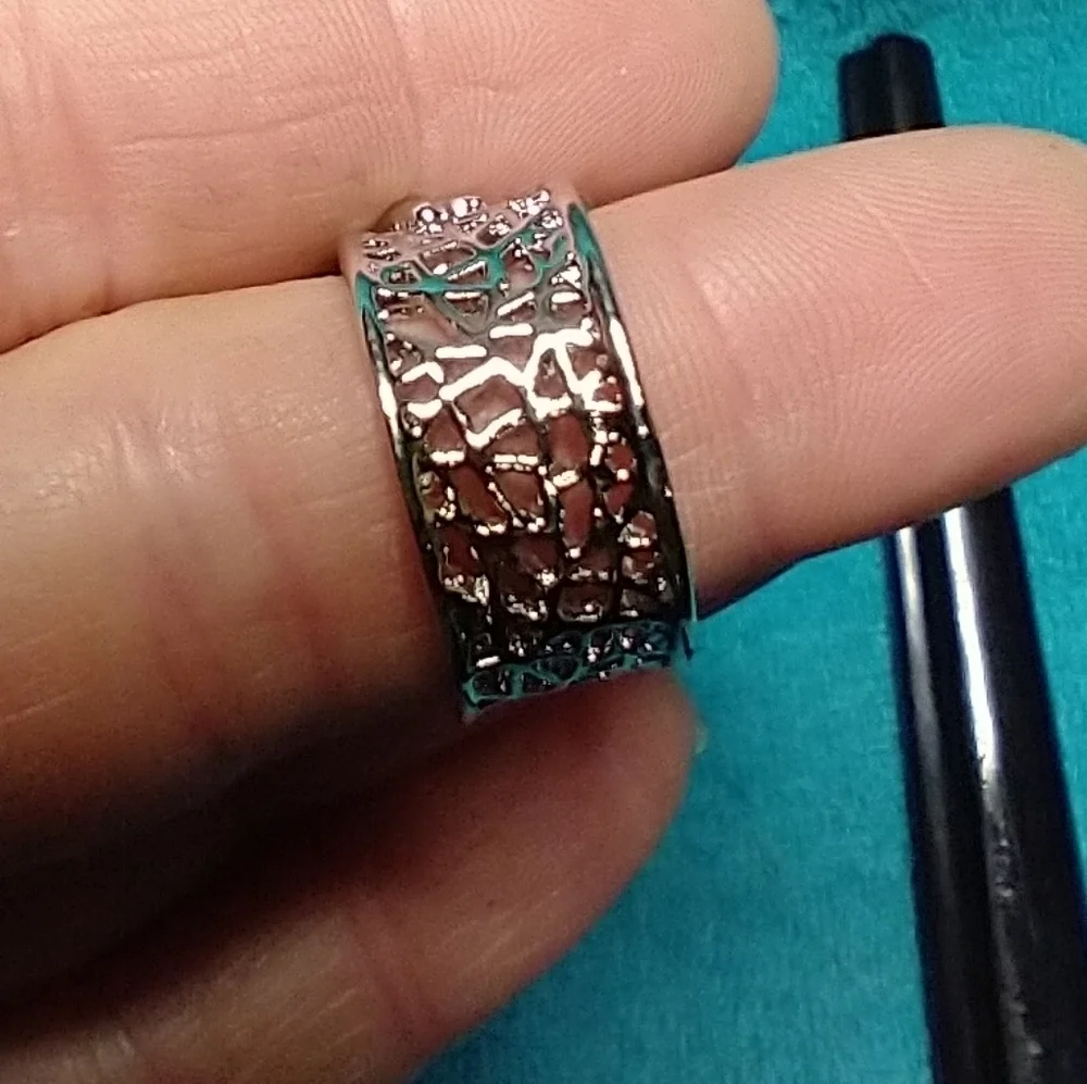 Silvertone spider web ring blue stone